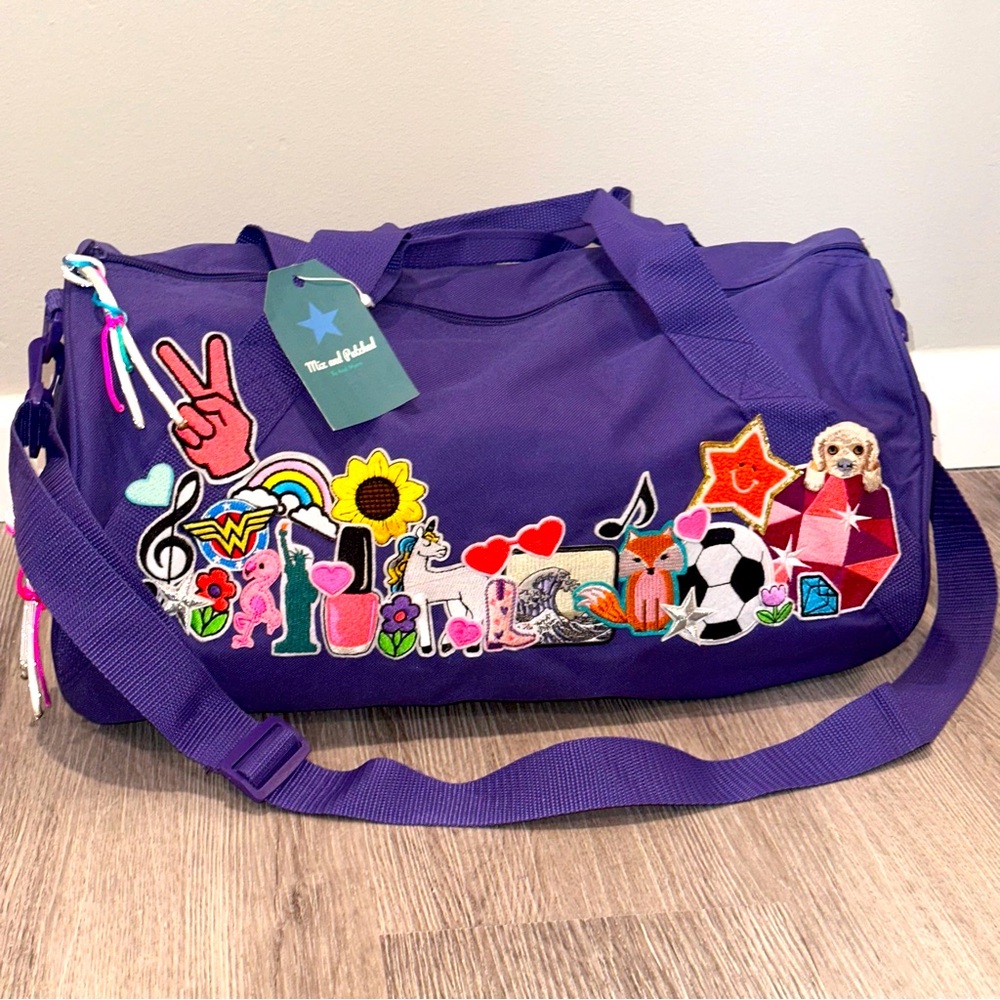 NWT Kids duffle bag with embroidery patches. purple.